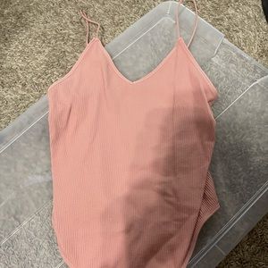 pink body suit